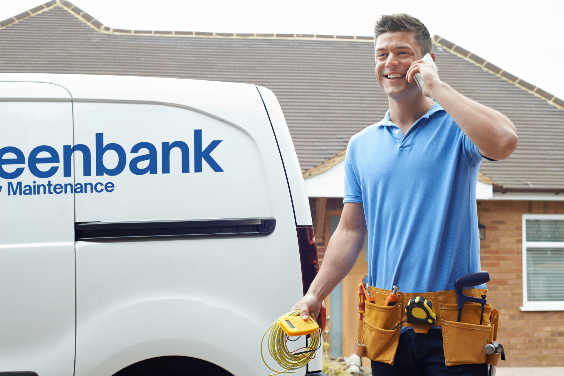 Greenbank Property Maintenance signwritten van with engineer on a call outside a property in Plymouth